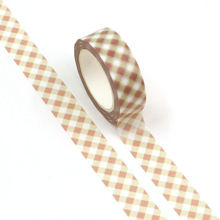 Image shows a light pink and white grid pattern washi tape