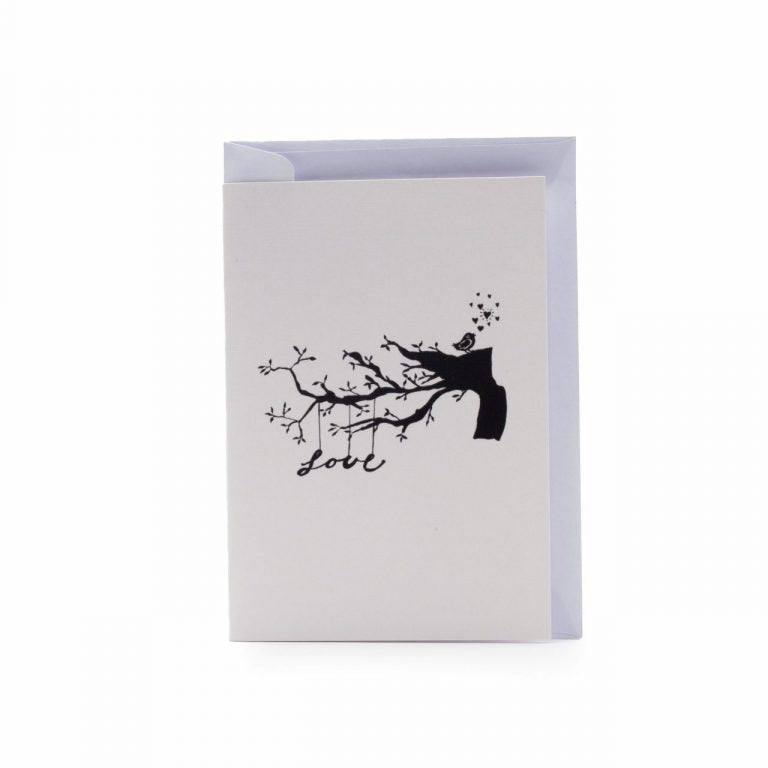 Image shows a greeting card with a tree illustration and the word "love" on it