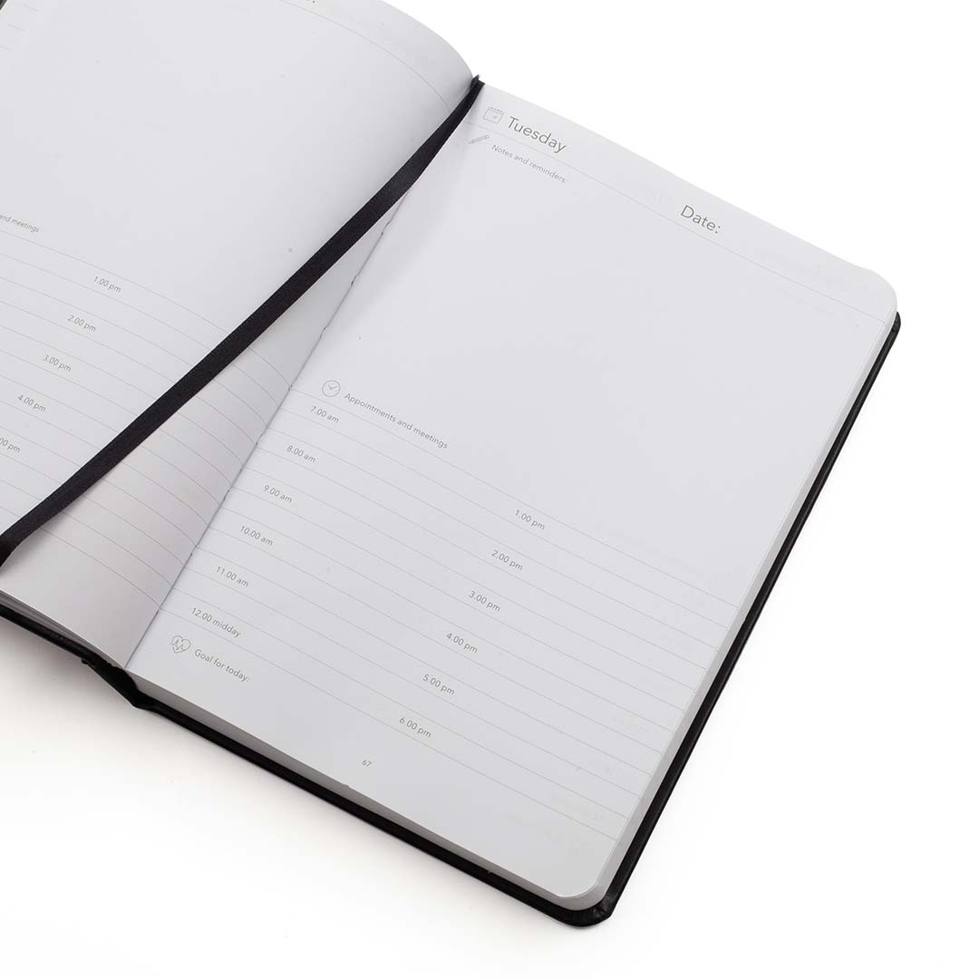 Image shows the daily page in the Rustik Leather MultiPlanner