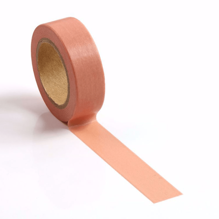 Image shows a solid pastel peach washi tape