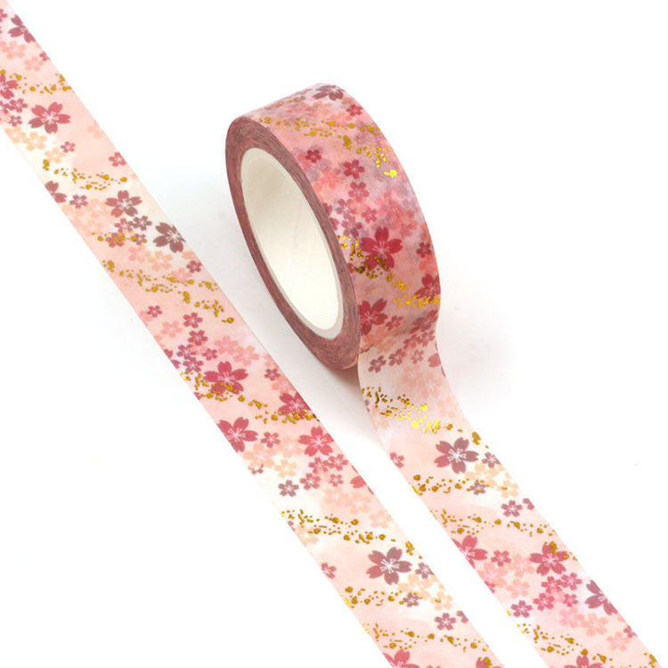 Image shows a pink flower pattern washi tape