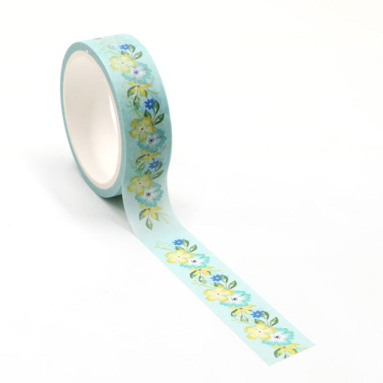 Image shows a blue and yellow flower pattern washi tape