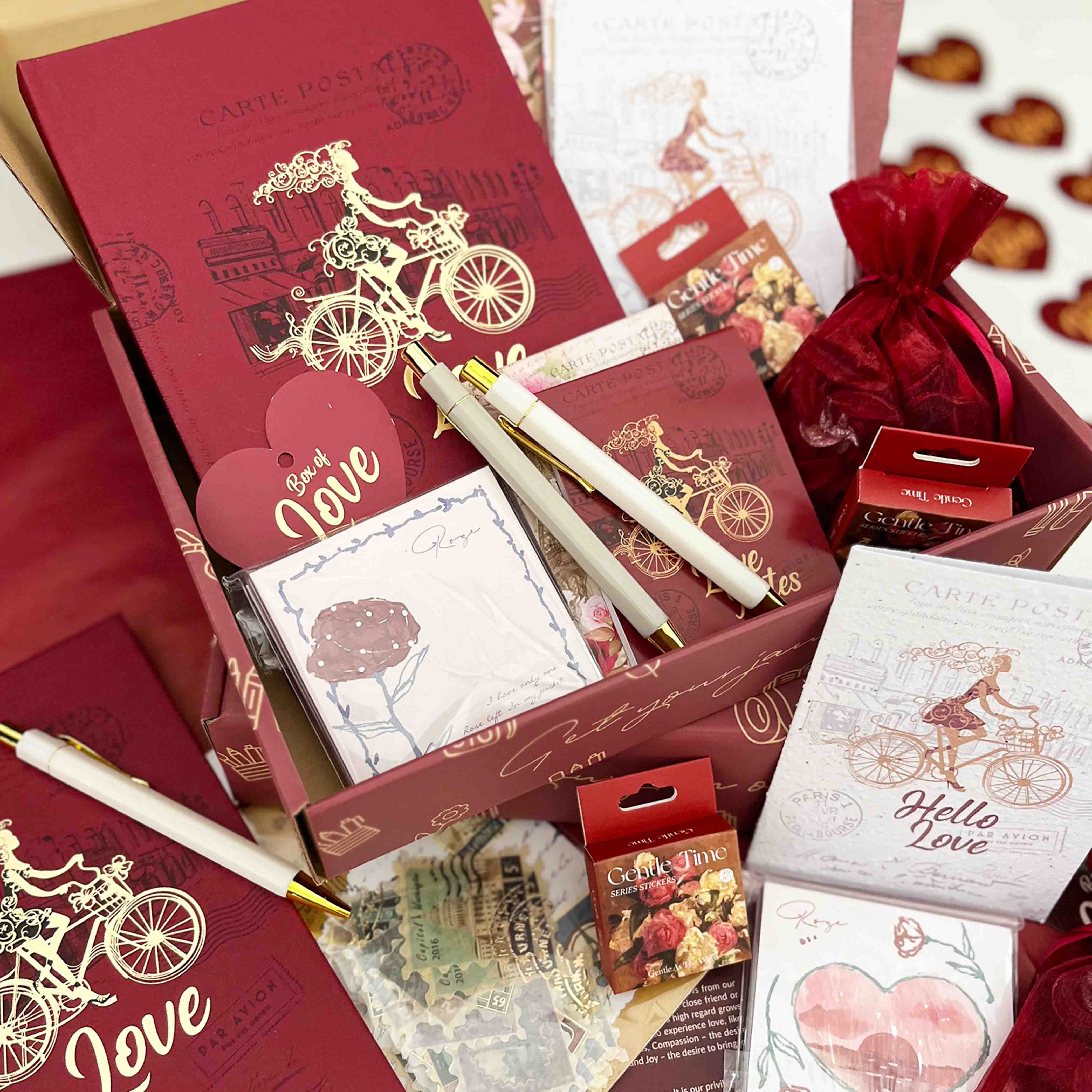 Image shows a love themed stationery box with it's contents
