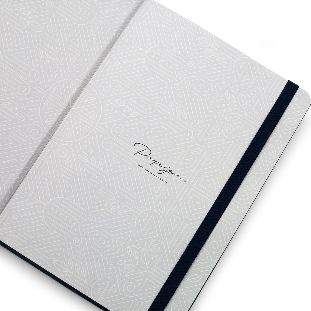 Image shows the endpapers of a Navy blue Classic Hardcover journal