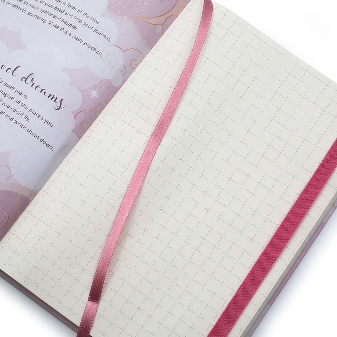 Image shows the dot grid pages of a Sun Dream Big journal 