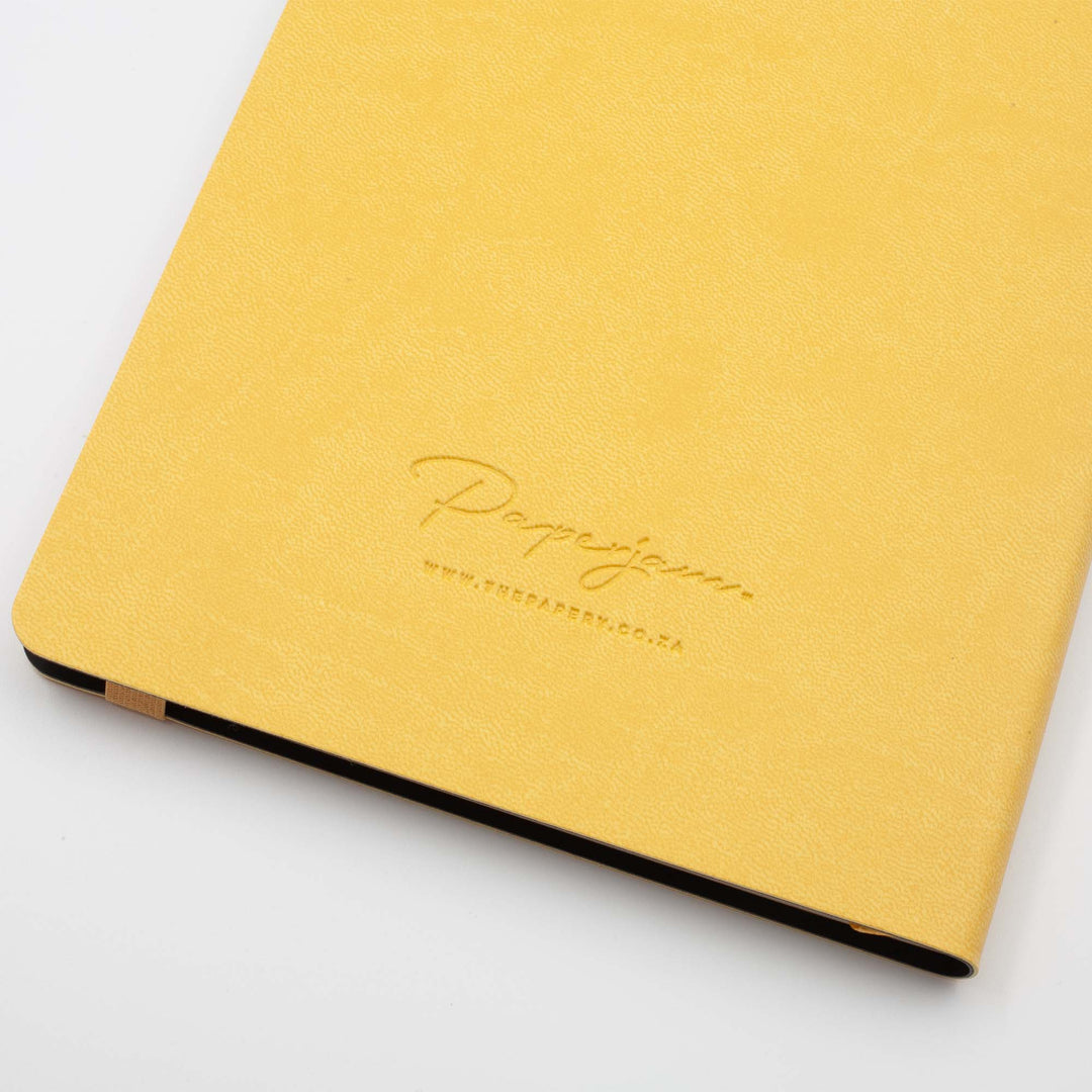 Image shows the back cover of a yellow Flexi softcover journal