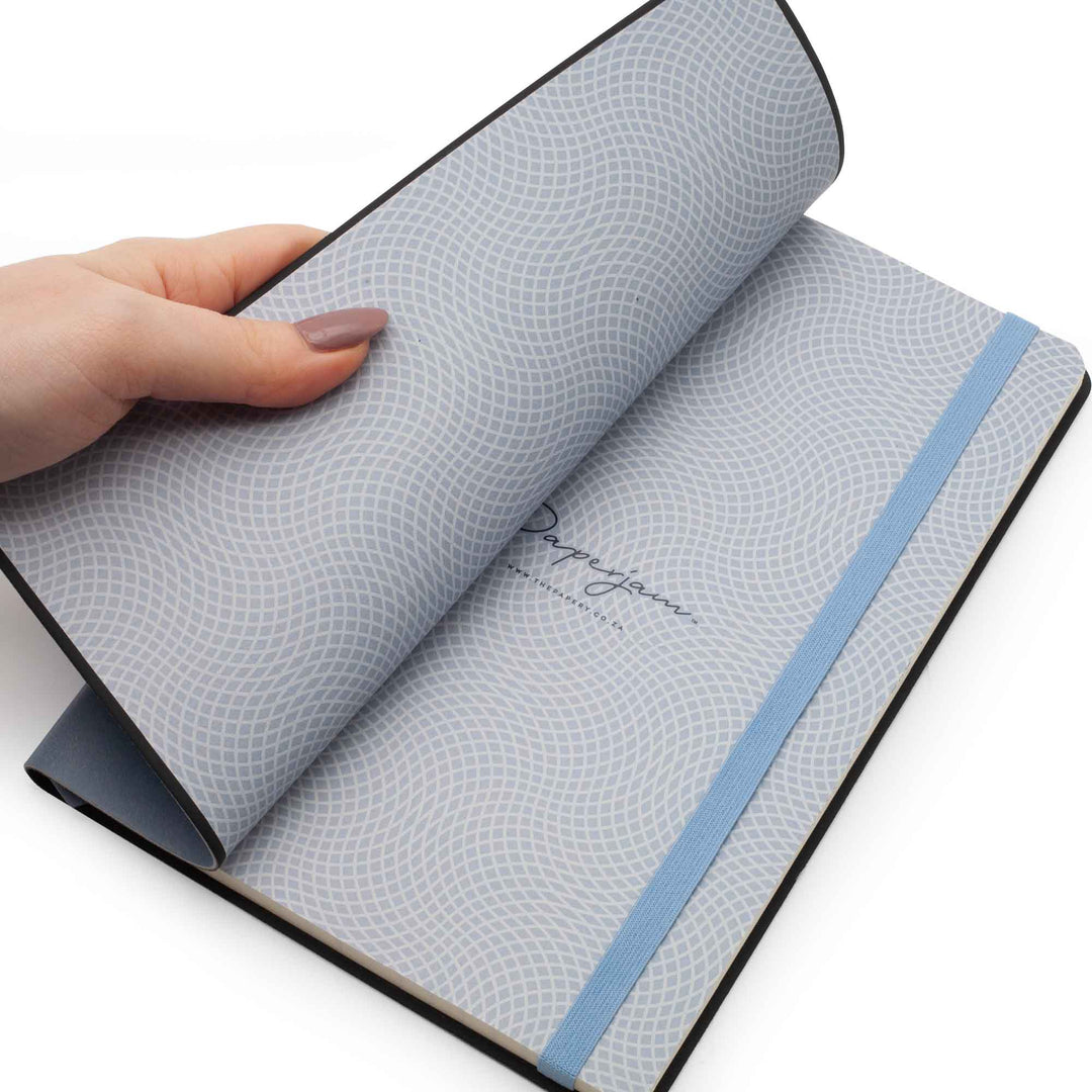 Image shows the endpapers of a cornflower Flexi softcover journal