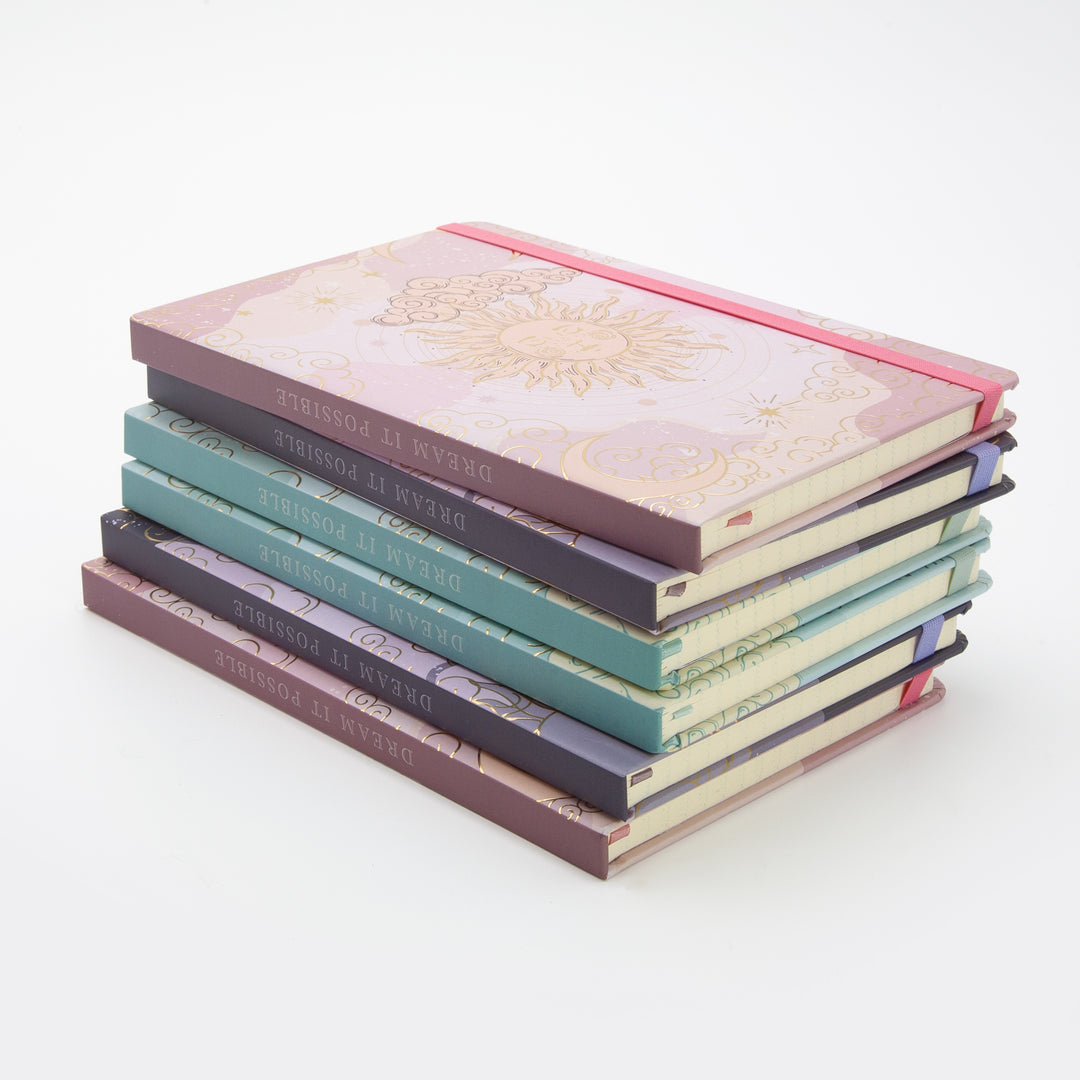 Image shows a group shot of the Dream Big journal range
