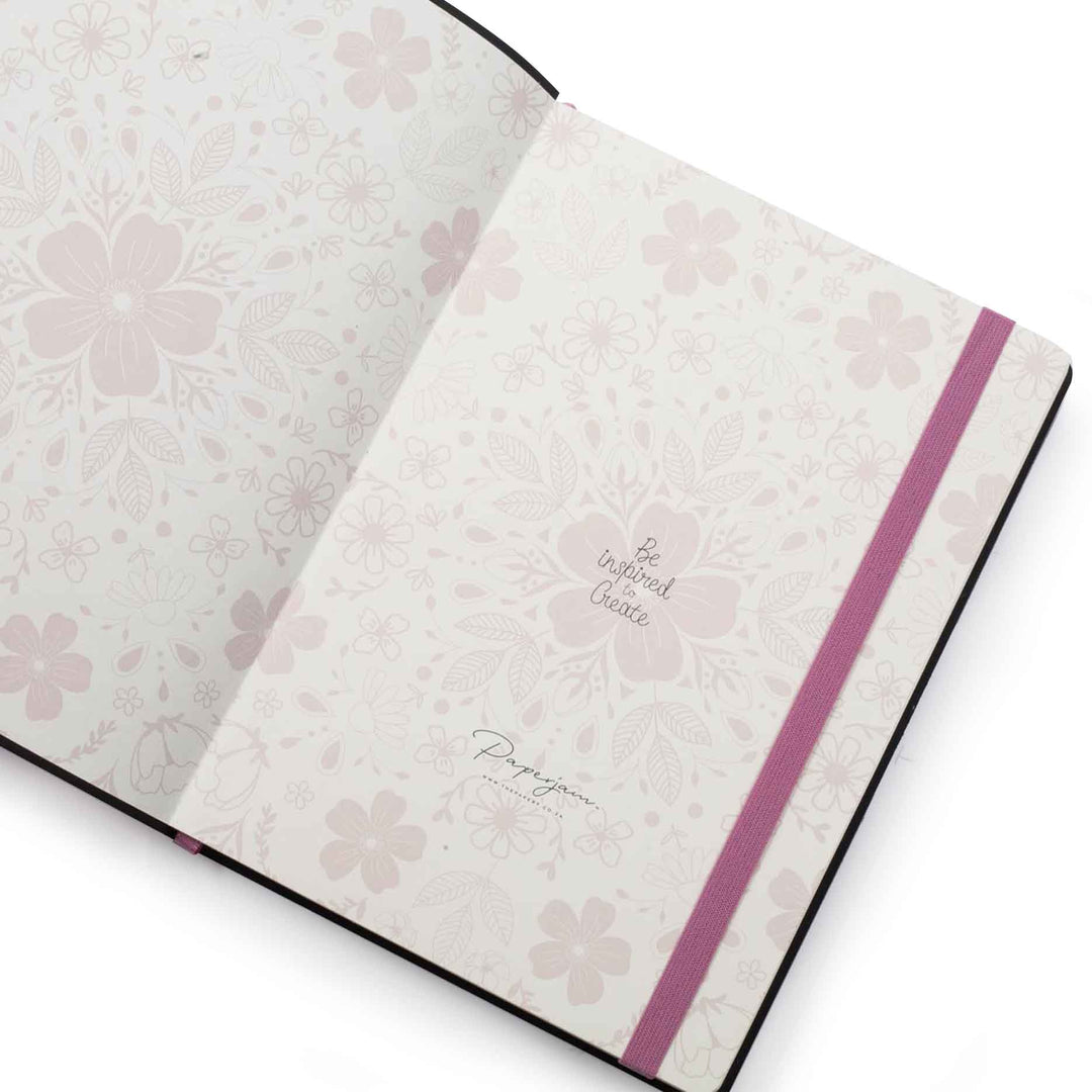 Image shows the endpapers of an orchid Flexi Premium journal
