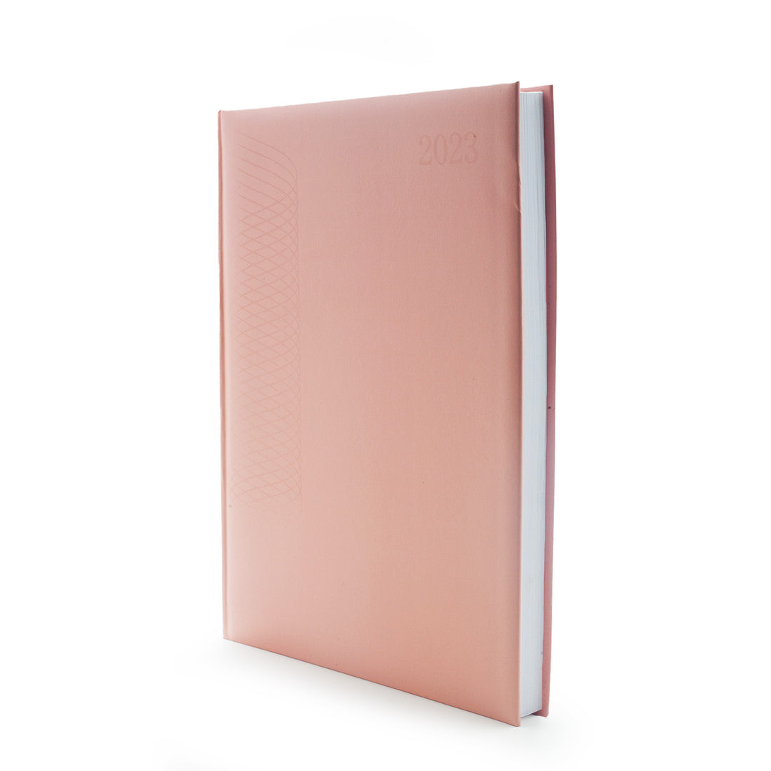 Image shows a pink A4 2023 planner