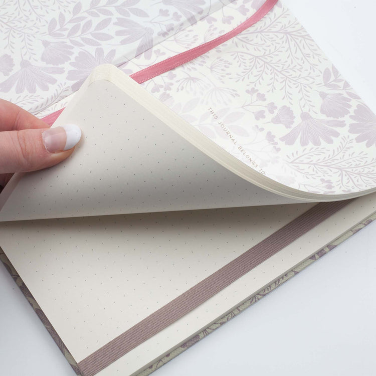 Image shows the dotted pages of a Spring Premium hardcover journal