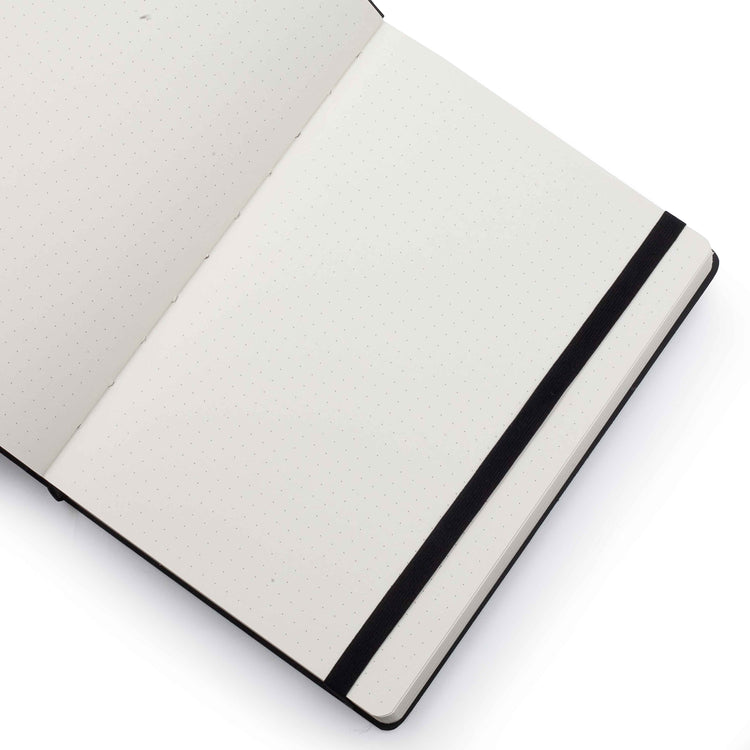 Image shows the dotted pages of a black Flexi Premium journal