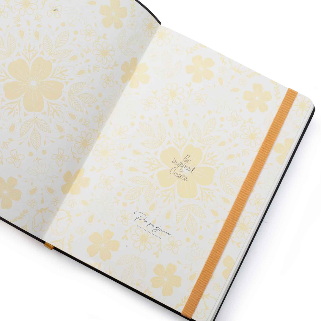 Image shows the endpapers of a yellow Flexi Premium journal